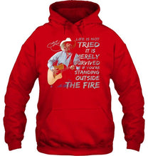 Load image into Gallery viewer, George strait life is not tried it is merely survived if you're standing outside the fire shirt