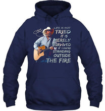 Load image into Gallery viewer, George strait life is not tried it is merely survived if you're standing outside the fire shirt